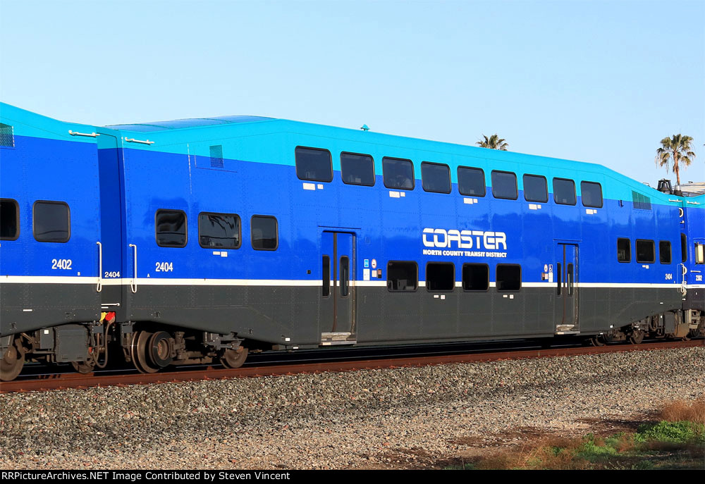 San Diego "Coaster" coach #2404 in new scheme.